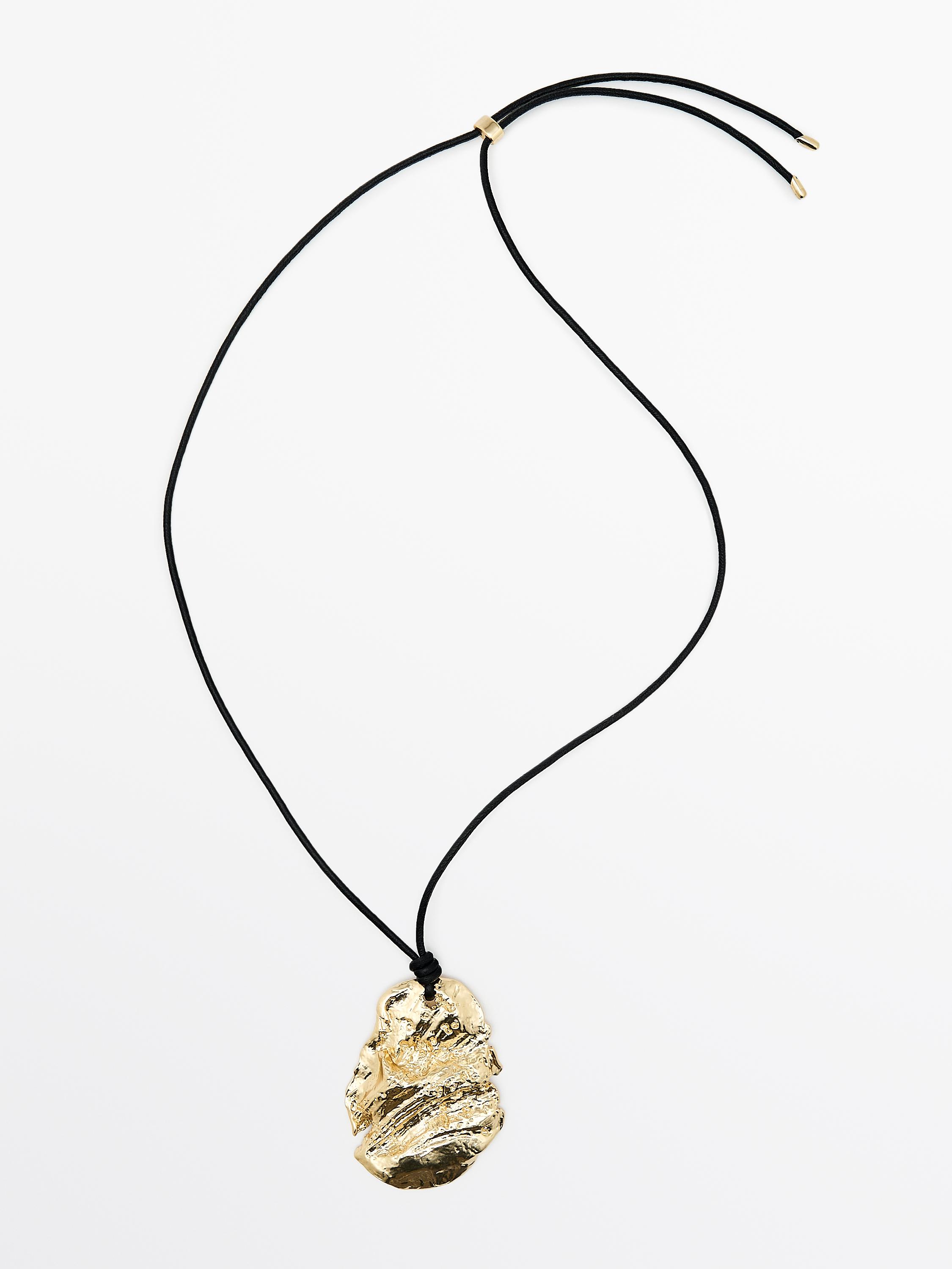 Leather cord necklace with fossil pendant